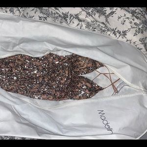 Had my prom. worn twice still in 10/10 condition.